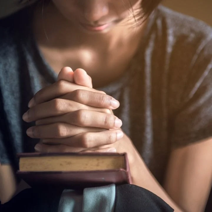 Safeguarding in the Faith Sector - young person praying